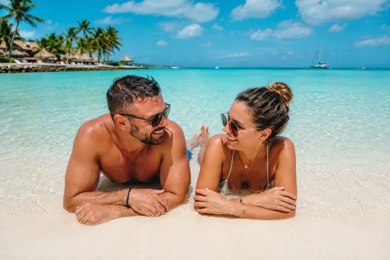 Adults-only Caribbean island vacations including Aruba Saint Lucia and Antigua planned by Piccola Travel, a Miami travel agency.