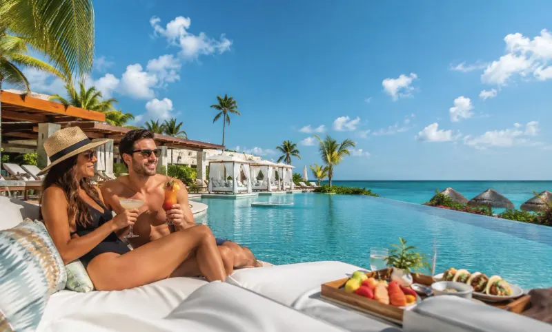 Luxury adults-only resort suite with private plunge pool and ocean view in Cancun Mexico, organized vacation by Piccola Travel a Miami travel agency.