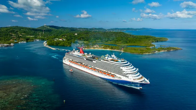 Carnival Cruise Lines at a Caribbean destination, planned and booked by Piccola Travel, a cruise travel agency in Florida.