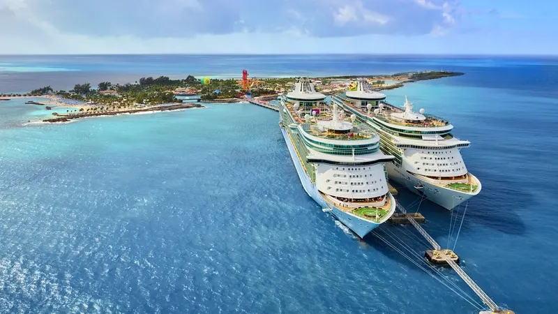 Royal Caribbean cruise ships at a Caribbean island destination, planned and booked by Piccola Travel, a cruise travel agency in Miami, Florida.