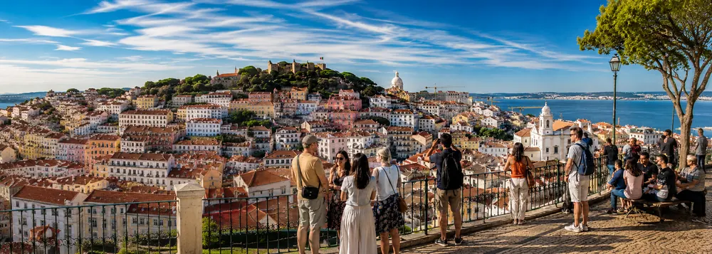 A view over Lisbon's Alfama rooftops on a Spain and Portugal vacation itinerary