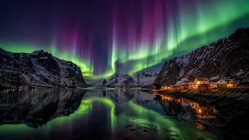 Northern lights over a fjord and mountains in Scandinavia