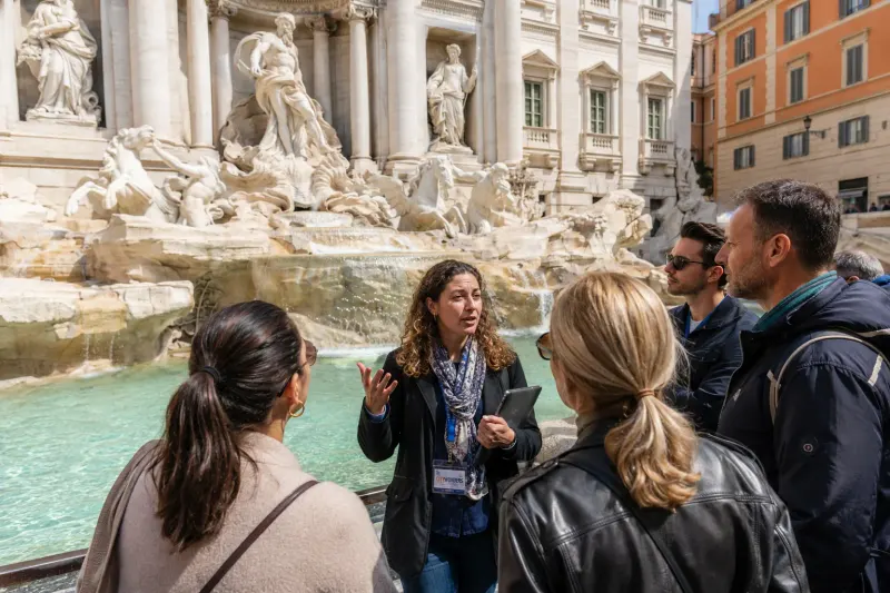Tourist group on a guided tour through Rome, Italy in Europe, organized by Piccola Travel in Miami.