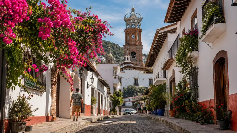 Cobblestone street and the crown of the Guadalupe church in Puerto Vallarta