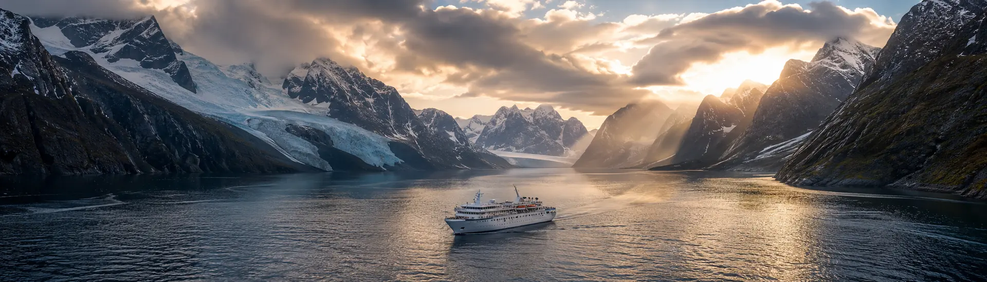 Expedition cruise ship sailing a glacier-lined Patagonian fjord near Cape Horn — South America cruises.