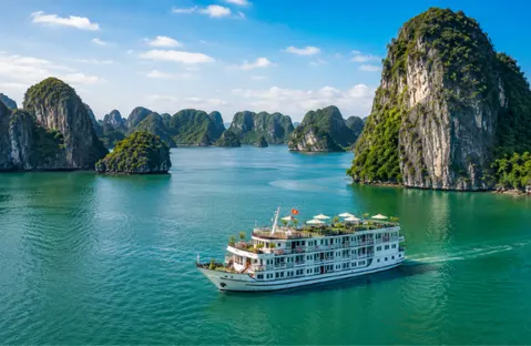 Piccola Travel Vietnam vacation — Ha Long Bay overnight cruise and Hanoi old quarter guided tour from Miami.