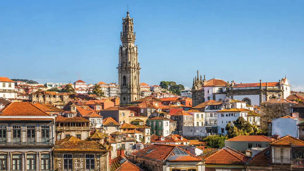 The Clerigos Tower rising over the rooftops of Porto on a clear day