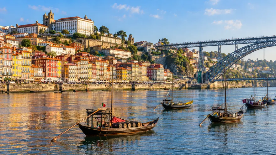 The colorful Ribeira quarter of Porto and the Dom Luis I bridge over the Douro River